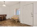 Entryway with tile floor, bench, and bar at 457 Turtleback Rd # D, Mesquite, NV 89027