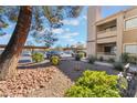 Covered parking area nestled in a meticulously landscaped community offers convenient parking for residents and guests at 5046 S Rainbow Blvd # 103, Las Vegas, NV 89118