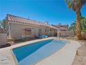 Inviting swimming pool in a sunny backyard oasis at 8474 Orange Cliff Ct, Las Vegas, NV 89123