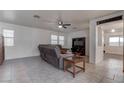 Bright and airy living room, comfortable seating area at 9290 Cool Creek Ave, Las Vegas, NV 89147