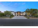 Elegant single-story home with landscaped front yard and driveway at 1121 Du Fort Hills Ct, Henderson, NV 89002