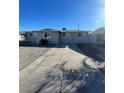 Single story home featuring a front yard and driveway with off-street parking in a residential neighborhood at 1737 W Nelson Ave, North Las Vegas, NV 89032