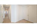 Bright hallway with tile flooring and access to other rooms at 3317 Barada Heights Ave, North Las Vegas, NV 89081