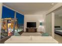 Living room with city views and access to bedroom at 3726 Las Vegas Blvd # 1601, Las Vegas, NV 89158