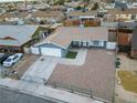 Single story home with driveway and small front yard at 4083 Eileen St, Las Vegas, NV 89115