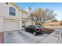 Garage and driveway of two story house at 7987 Cina Ave, Las Vegas, NV 89147