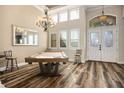 Spacious game room featuring a pool table and large windows at 2012 Poetry Ave, Henderson, NV 89052