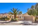 Beautiful single-story home with desert landscaping and tile roof at 2277 Canyonville Dr, Henderson, NV 89044