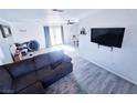 Living room features hardwood floors and a comfortable couch at 2851 Goldrush St, Pahrump, NV 89048