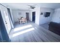 Spacious living room with hardwood floors and lots of natural light at 2851 Goldrush St, Pahrump, NV 89048