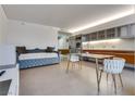 Modern open living area with a kitchen, stylish seating and dining area at 3722 Las Vegas Blvd # 305, Las Vegas, NV 89158