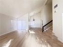 Bright and spacious living room with high ceilings, hardwood floors and a chandelier at 4684 Trevins Ave, Las Vegas, NV 89103