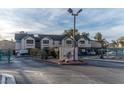 Community entrance with gate and signage at The Keys at 5261 Lindell Rd # 205, Las Vegas, NV 89118