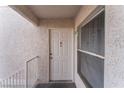 Condo entryway with door and window at 6800 E Lake Mead Blvd # 2035, Las Vegas, NV 89156
