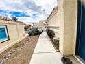Pathway leading to the house entrance with landscaping at 9552 Wooden Pier Way, Las Vegas, NV 89117