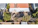 Aerial view of a shady backyard with lots of trees and a patio at 5873 Corazon Dr, Las Vegas, NV 89103