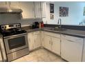 Updated kitchen featuring stainless steel appliances and gray countertops at 6250 W Flamingo Rd # 88, Las Vegas, NV 89103