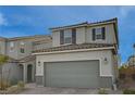 Two-story house with gray siding, gray garage door, and dark brown window shutters at 7675 W Mistral Ave, Las Vegas, NV 89113