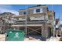 A new two-story home under construction featuring scaffolding around a stucco exterior at 9156 Benton Woods St, Las Vegas, NV 89113