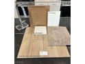 Sample of interior home finishes including Benton Quill upgraded cabinets and Layton Lake Driftwood luxury vinyl plank at 9156 Benton Woods St, Las Vegas, NV 89113