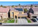 Beautiful elevated view of a well-maintained two-story home with solar panels at 10654 Sidlaw Hills Ct, Las Vegas, NV 89141