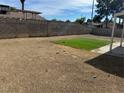 Backyard with artificial turf and gravel areas at 11 Page St, Las Vegas, NV 89110