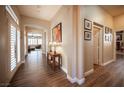 Inviting hallway with stylish wood floors leading to the living areas and bedrooms at 1901 Shady Elm St, Las Vegas, NV 89135