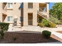 Building exterior showing stairs and landscaping at 2110 Los Feliz St # 1046, Las Vegas, NV 89156