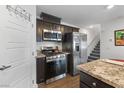 Close up of the kitchen featuring stainless steel appliances and granite countertops at 3558 Herodain Ave, Las Vegas, NV 89106