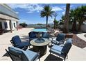 Backyard area with a pool, mature landscaping, water feature, and lounge area at 4193 W Warm Springs Rd, Las Vegas, NV 89118