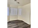 Bright dining room with gray vinyl flooring and large windows at 5002 S Rainbow Blvd # 106, Las Vegas, NV 89118