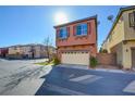 Attractive two-story townhome with attached garage at 8557 Nature Scene Dr, Las Vegas, NV 89139