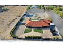 Expansive backyard with a pool, lush greenery, and ample space for outdoor activities at 8880 W Ann Rd, Las Vegas, NV 89149