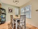 Bright dining area with a table and four chairs at 3055 Key Largo Dr # 203, Las Vegas, NV 89120