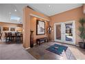 Spacious entryway with tile flooring, double doors, and view to kitchen at 479 Via Ventana Dr, Mesquite, NV 89027