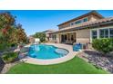 Luxury pool with a large patio and seating area at 2920 Josephine Dr, Henderson, NV 89044