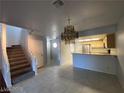 Open floor plan with kitchen, dining, and living room at 6250 W Flamingo Rd # 98, Las Vegas, NV 89103