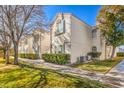Condo building exterior showcasing landscaping and walkway at 1800 Edmond St # 124, Las Vegas, NV 89146