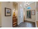 Bright and airy entryway with tile flooring and elegant decor at 1975 Alcova Ridge Dr, Las Vegas, NV 89135