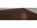 Close-up of the beautiful, rich hardwood flooring at 6786 Grandola Dr, Las Vegas, NV 89103