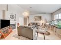 Spacious living room featuring a fireplace and ample seating at 1608 N Torrey Pines Dr # 104, Las Vegas, NV 89108
