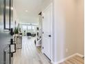 Bright entryway with tile floors and view into living area at 2417 Fasano St, Henderson, NV 89044