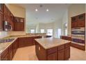 Spacious kitchen with granite countertops and stainless steel appliances at 6412 Moss Agate Dr, Las Vegas, NV 89131
