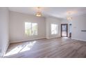 Bright living room with light wood flooring and neutral walls at 9303 Gilcrease Ave # 2172, Las Vegas, NV 89149