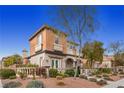 Two-story home with balcony, landscaping, and stone accents at 11262 Corsica Mist Ave, Las Vegas, NV 89135