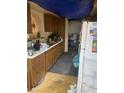 This kitchen area is in need of repair at 1836 Mcdaniel St, North Las Vegas, NV 89030