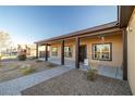 Inviting front porch features a brick walkway and comfortable outdoor space at 3101 S Spy Glass Ave, Pahrump, NV 89048