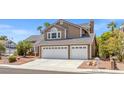 Charming two-story home featuring a three-car garage and well-maintained landscaping at 3305 Cutty Sark St, Las Vegas, NV 89117