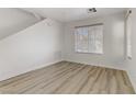 Bright living room with light wood floors at 4793 Cannon Hill Ct, Las Vegas, NV 89130