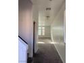 Bright hallway with carpeted floor leading to living room at 7155 Steele Canyon St, Las Vegas, NV 89118